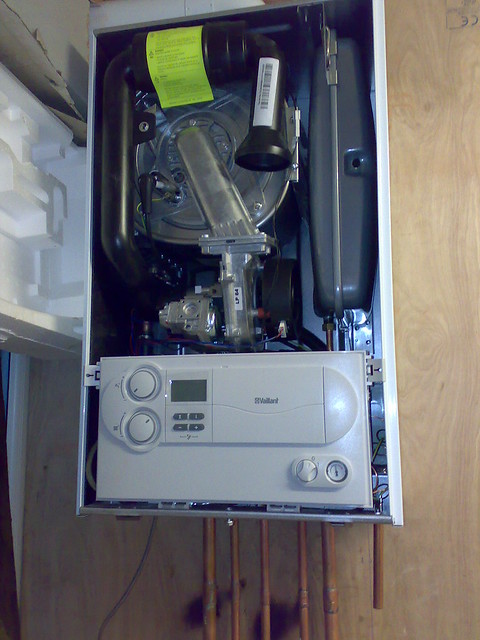 shower-going-hot-and-cold-combi-boiler-justboilers